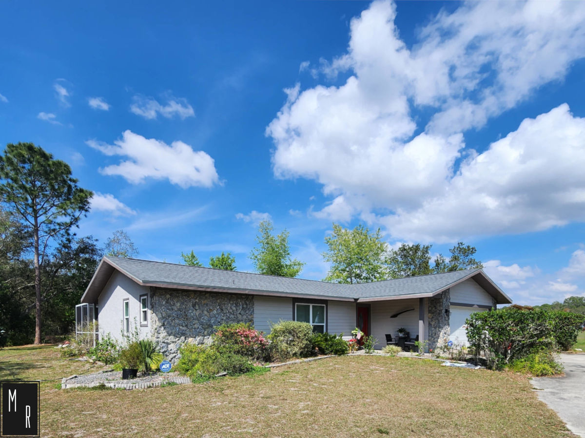 Photo of a house with recently replaced roof.