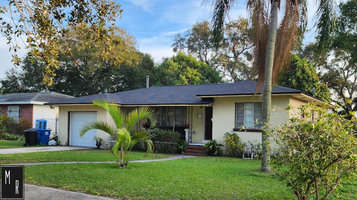 Photo of a house with newly replaced roof.